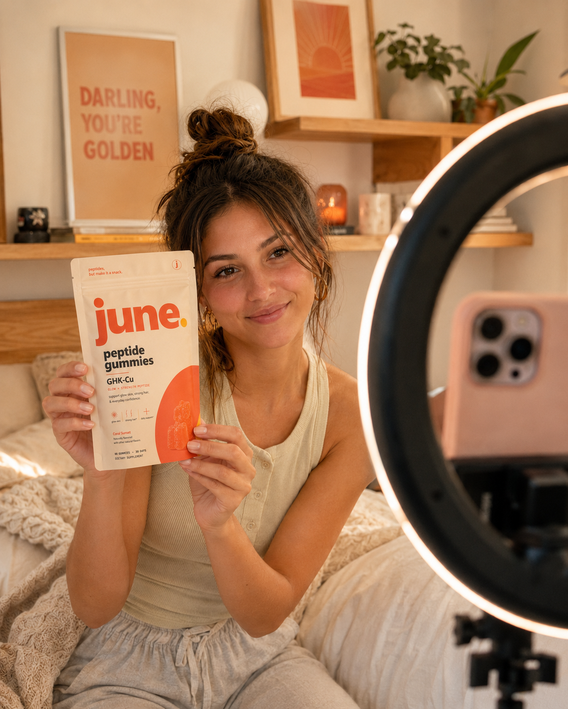 Creator filming a review with a June pouch and ring light